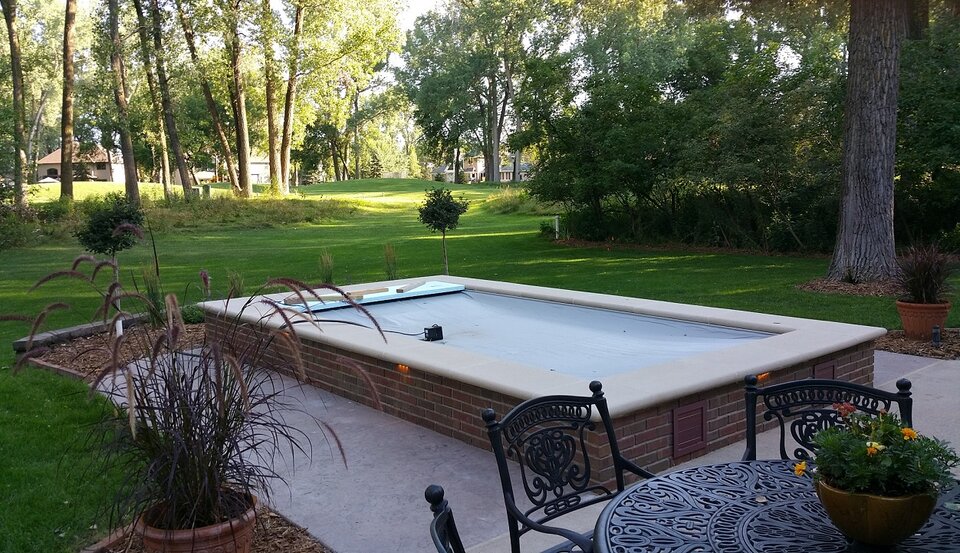 The covered pool and patio with the room removed.