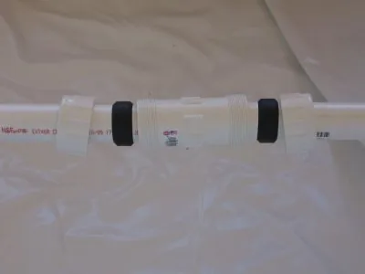 Couplers and straps around the support sleeve