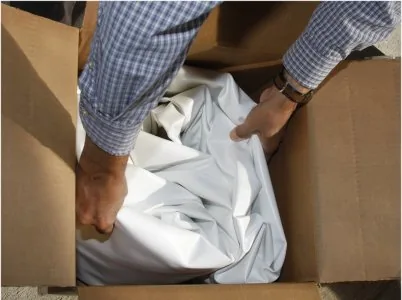Unpacking the white vinyl liner