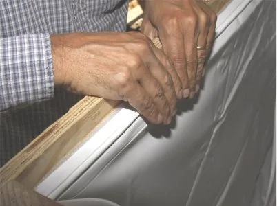 Pressing T-Lock above the liner bead