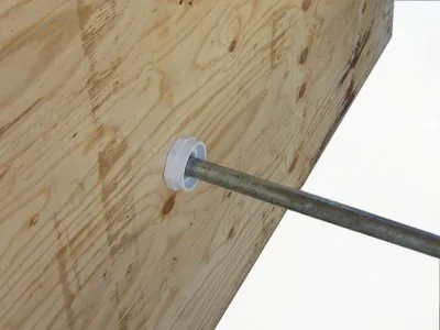 Support conduit passing through the wooden wall