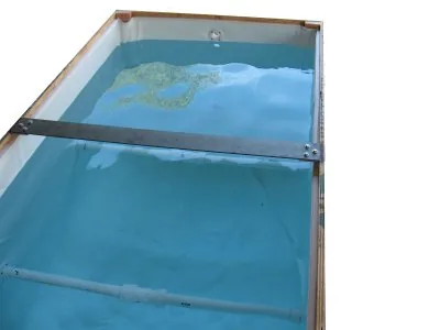 View across the filled wooden tank