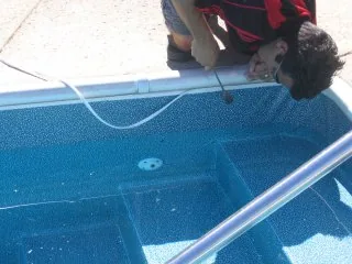 Tapping T-Lock into place with a hammer