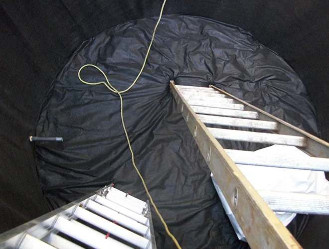 Ladder inside the tank during liner installation
