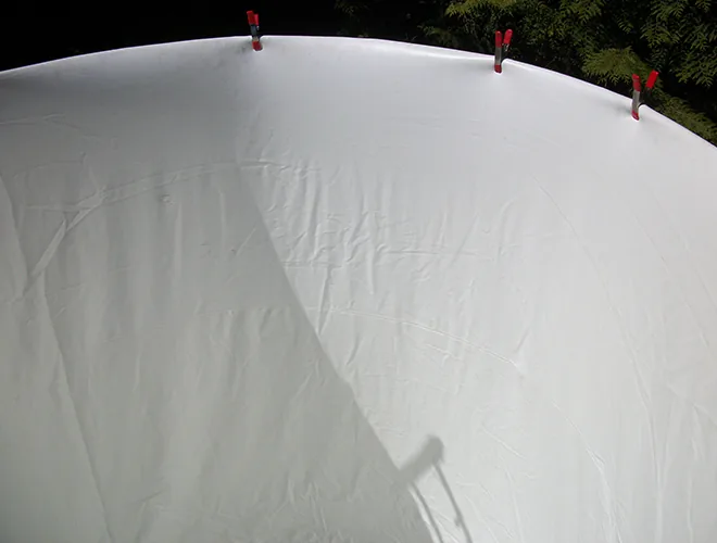 White liner positioned against the tank wall