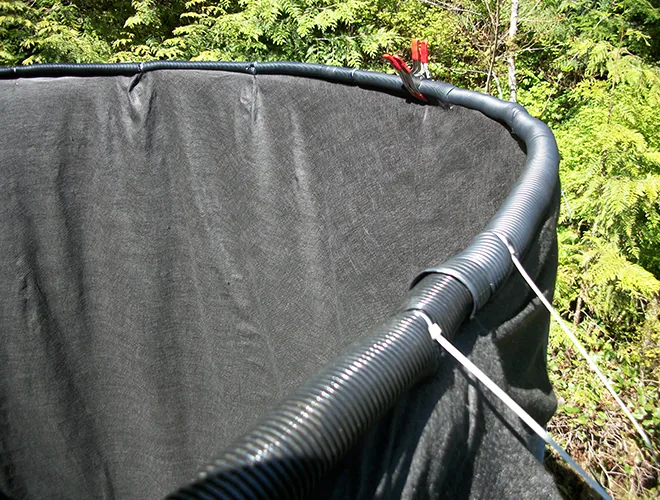 Padding secured over the tank rim