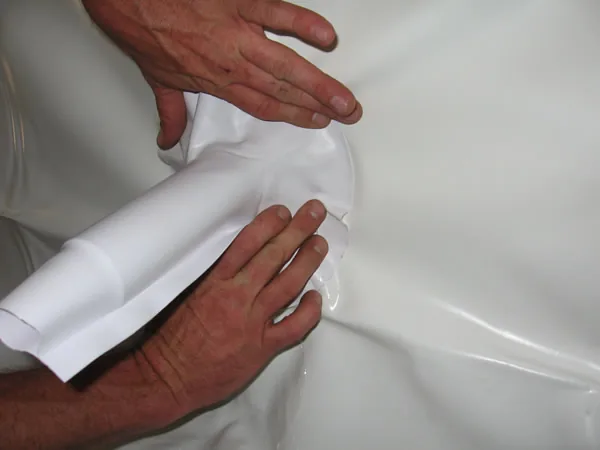 Pressing the brim down to create a seal